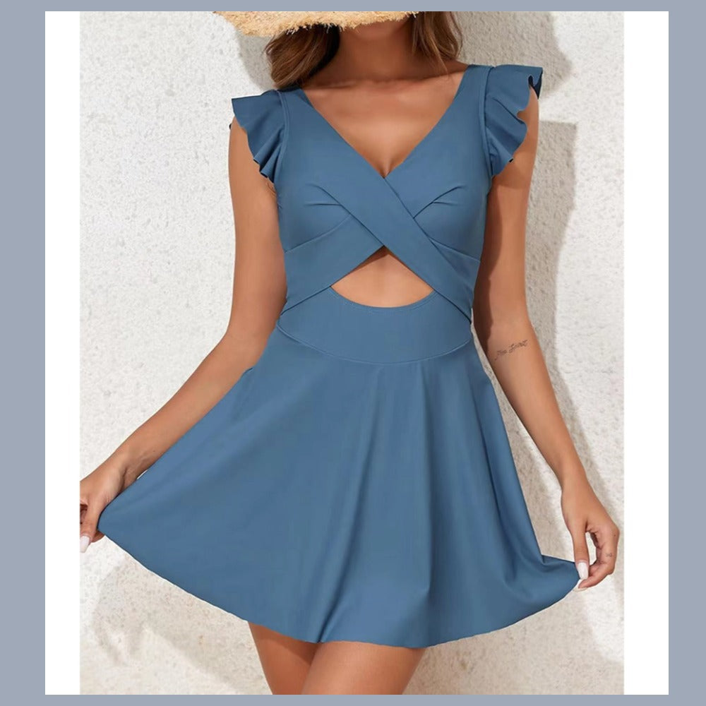 One-piece swimming suit with frilled cross-shaped skir